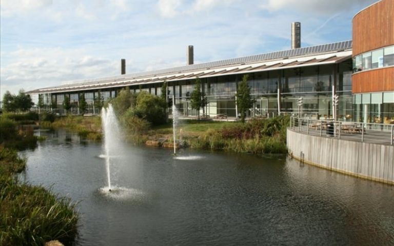 Landscaped fish pond and fountains outside the CEME Campus